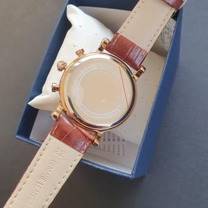Reloj cronógrafo para hombre con fase lunar rosa, luminoso, números romanos clásicos, oro rosa, correa de cuero marrón, reloj de pulsera profesional para caballero. imagen 3