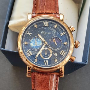 Montre chronographe homme rose phase de lune lumineuse classique chiffre romain or rose bracelet en cuir marron professionnel montre-bracelet pour homme
