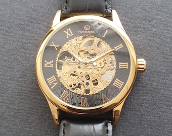 Herren Automatikuhr Handaufzug Mechanisches Uhrwerk Skeleton Gold Lederarmband Professionelle Gentleman Armbanduhr