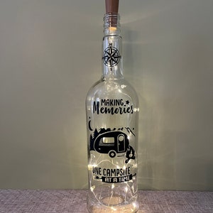 Decorated Wine Bottle with Fairy Lights: Camping Decor