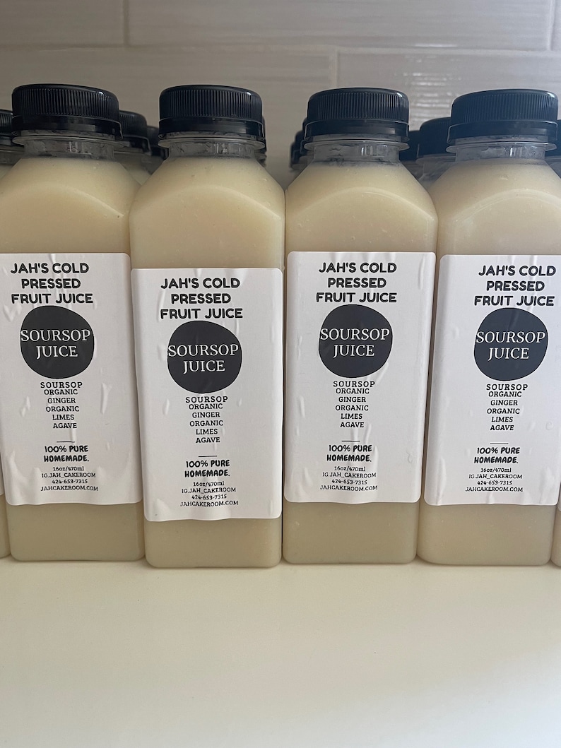 May include: Four clear glass bottles of cold-pressed soursop juice with black lids. The labels are white with black text and say "Jah's Cold Pressed Fruit Juice" and "Soursop Juice". The ingredients are listed as soursop, organic ginger, organic limes, and agave. The bottles are 16 oz/470 ml and are 100% pure homemade. The website is jahcakerooom.com.