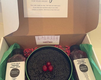 Pastel jamaicano, pastel navideño, pastel de frutas, pastel caribeño. Cajas de regalo navideñas de pastel de acedera y negro.