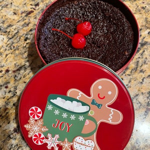 Jamaican black cake,fruit cake,black cake,Caribbean cake. Thanksgiving desserts/Christmas desserts.In Christmas tin gift cans. Holiday gift.