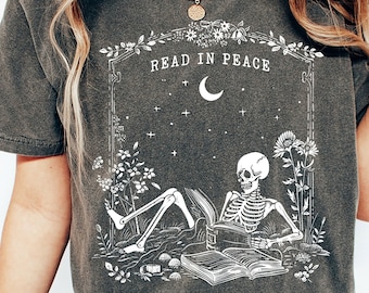 Read in Peace T-Shirt, Skeleton Book Shirt, Skeleton Reading T-Shirts, Book Lover Halloween Gift, Dark Romans Tee, Bookish Halloween Shirts
