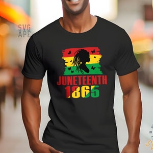 May include: Black t-shirt with a red, yellow and green graphic design. The graphic features a silhouette of a woman with butterflies and the text "Juneteenth 1865".