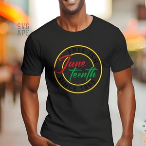 May include: A black t-shirt with a yellow, red and green circle graphic that says "Free-ish Juneteenth Since 1865".