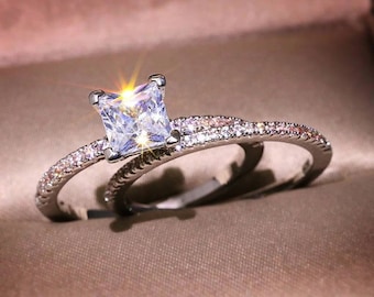 プリンセスカットダイヤモンドシルバーリングセット、925スターリングシルバーのプリンセスカットエンゲージメントブライダルセット、マッチングバンドセット、結婚指輪、女性へのギフト