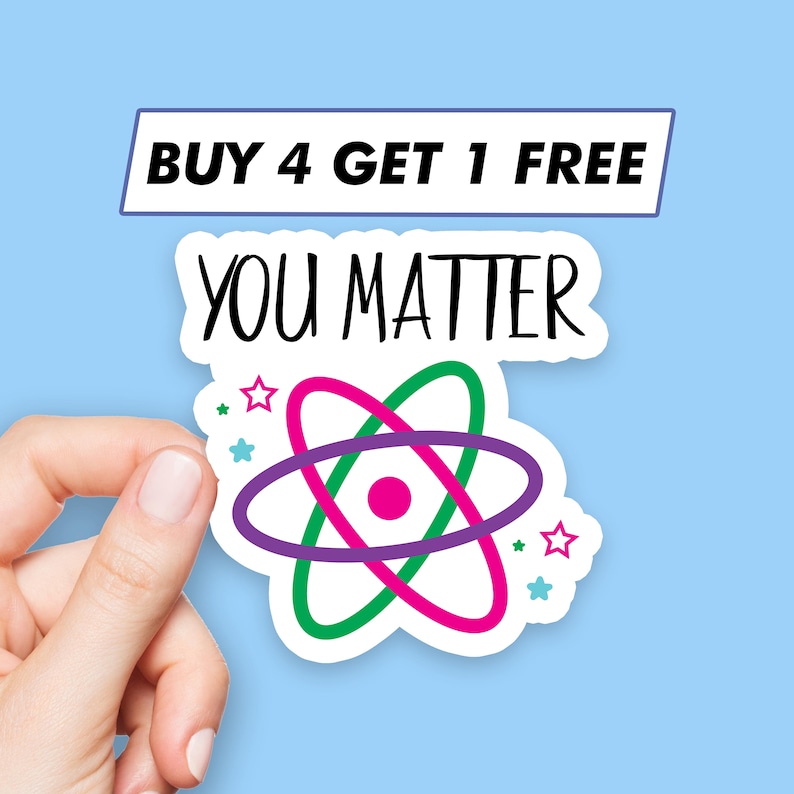 Op de afbeelding: Een witte sticker met een roze, groene en paarse atoomontwerp. De sticker zegt "You Matter" en heeft een klein sterontwerp rond het atoom. De sticker heeft ook een banner bovenaan die zegt "Buy 4 Get 1 Free".