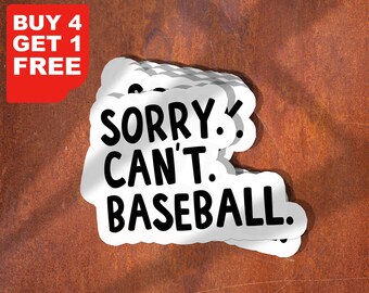 May include: A stack of white stickers with the text "SORRY. CAN'T. BASEBALL." on a brown background. A red rectangle in the top left corner reads "BUY 4 GET 1 FREE". The stickers are cloud-shaped.