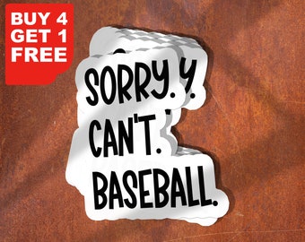 May include: White sticker with black text that reads "Sorry. Can't. Baseball." The sticker is stacked on top of itself multiple times.