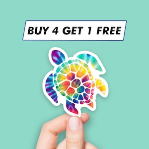 May include: A colorful tie-dye sea turtle sticker. The turtle is outlined in white and has a rainbow tie-dye pattern.