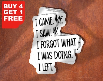 May include: White stickers with the text "I CAME. ME. I SAW. W. I FORGOT WHAT I WAS DOING. I LEFT." are stacked on a rusty brown surface. A red rectangle in the upper left corner reads "BUY 4 GET 1 FREE."