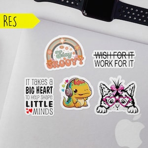 May include: Four colorful stickers with different designs and text. The first sticker features a rainbow with the text "Stay Groovy". The second sticker features a dinosaur wearing headphones with the text "It takes a big heart to help shape little minds". The third sticker features a cat wearing heart-shaped glasses with the text "Wish for it work for it". The fourth sticker features a rainbow with the text "Stay Groovy".