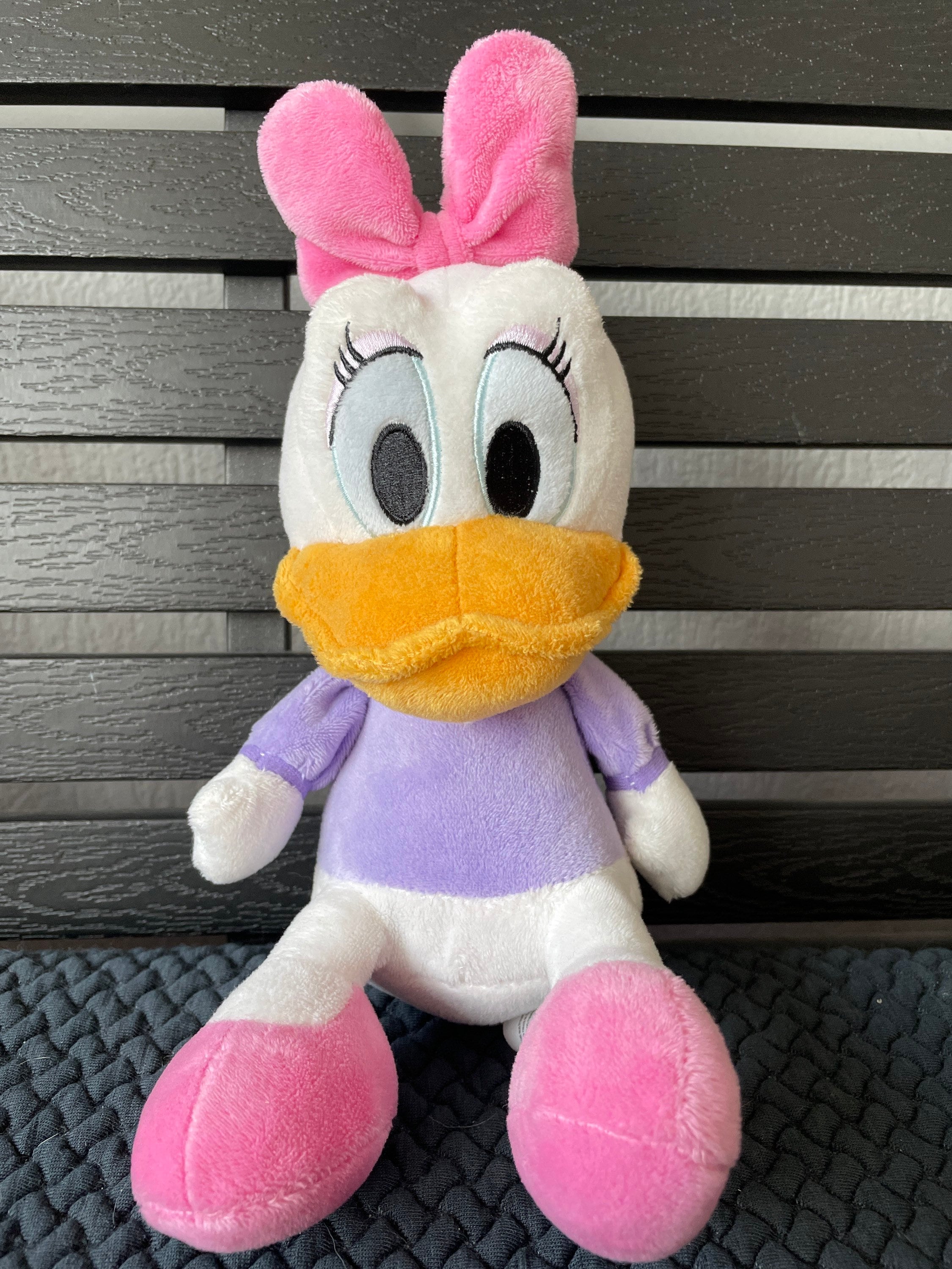 本物のディズニーデイジーピンクのリボンかわいいアヒルの