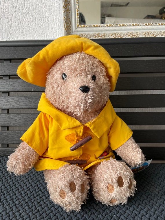 Paddington en imperméable jaune et chapeau, veste vintage