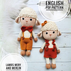 May include: Two crocheted amigurumi lambs, one wearing orange overalls and a red bow tie, the other wearing a red skirt and a small orange bow. The lambs are on a white wooden surface with the text "LAMBS MERY AND MERLIN" and "ENGLISH PDF PATTERN" in white circles.