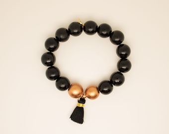 Mala wooden bead bracelet, black with tassel, with sterling silver bead, rose gold plated, statement jewellery, elastic, boho