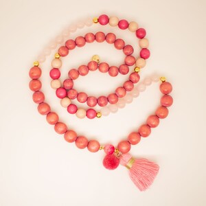 Mala necklace lovely pink, with wooden beads in pink and cream, rose quartz and agate as well as tassel and pompom, gold-plated sterling silver beads, boho