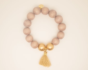 Mala wooden bead bracelet taupe with wooden beads and tassel with sterling silver bead, elastic