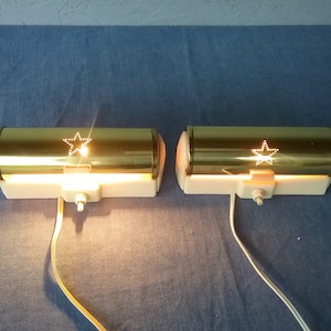 Scandinavian pair of mid-century wall sconces, bakelite wall fixtures with copper shades, Swedish sconces