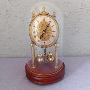 Hermle table clock with rotating ball pendulum and glass dome, German vintage style mantel clock, housewarming gift, fully working clock