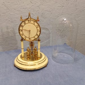 Kundo Kieninger & Obergfell mechanical anniversary clock with rotating pendulum and glass dome, German clock, fully working table clock
