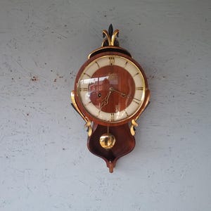 Junghans, Wanduhr mit Pendel Modell ""Genfa"", 1950er Jahre, Teak Holz Uhr, Mid-Century Holzuhr, voll funktionsfähige Uhr, Sammleruhr."