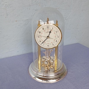 Vintage Junghans table clock with rotating pendulum and plastic dome, German mantel clock, housewarming gift, fully functional clock.