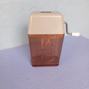 RECORD vintage hand crank mixer in a container with four measuring scales, manufactured in the GDR, blender