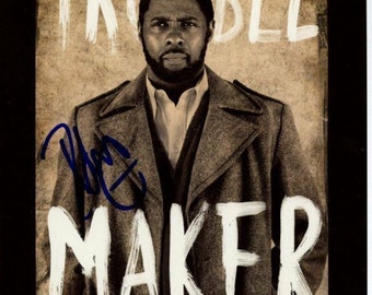 Idris Elba firmó una foto autografiada de Mandela de 8x10