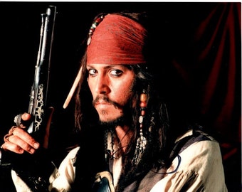 ジョニー・デップのサイン入り8x10パイレーツ・オブ・カリビアン