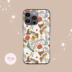 May include: A white phone case with a repeating pattern of Harry Potter-themed illustrations. The design includes house scarves, sorting hats, scrolls, and crests. The case has a triple-lens camera and the text "Glizty Lux" is visible.