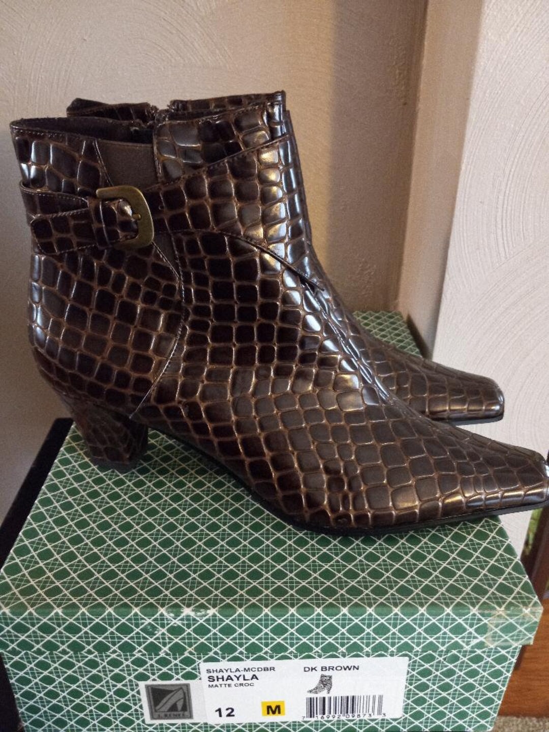 snakeskin booties brown