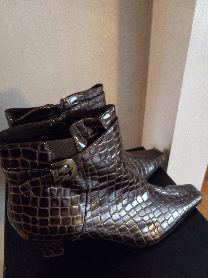 snakeskin booties brown