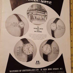 May include: A black and white advertisement for Eterna-Matic watches. The ad features a drawing of a storefront with the text "Watches of Switzerland Ltd." and "Eterna-Matic" in bold letters. The ad also features four different watch models with descriptions of their features and prices.
