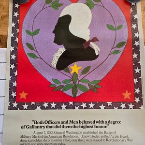 May include: A vintage poster with a red heart shape containing a silhouette of George Washington. The heart is surrounded by a border of white stars on a red background. The text reads "Both Officers and Men behaved with a degree of Gallantry that did them the highest honor."  "August 7, 1782. General Washington established the Badge of Military Merit of the American Revolution... known today as the Purple Heart. America's oldest decoration for valor, only three were issued to Revolutionary War soldiers and only one exists today. Join the people who've joined the Army."