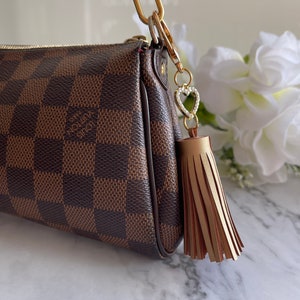 Metalic Gold Faux (Vegan) Leather Tassel Handbag/Purse Charm .Price includes taxes,tariffs,shipping. Beautifully gift wrapped