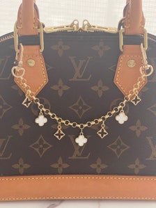 Louis Vuitton Brown Tassel Bag Charm ○ Labellov ○ Buy and Sell Authentic  Luxury