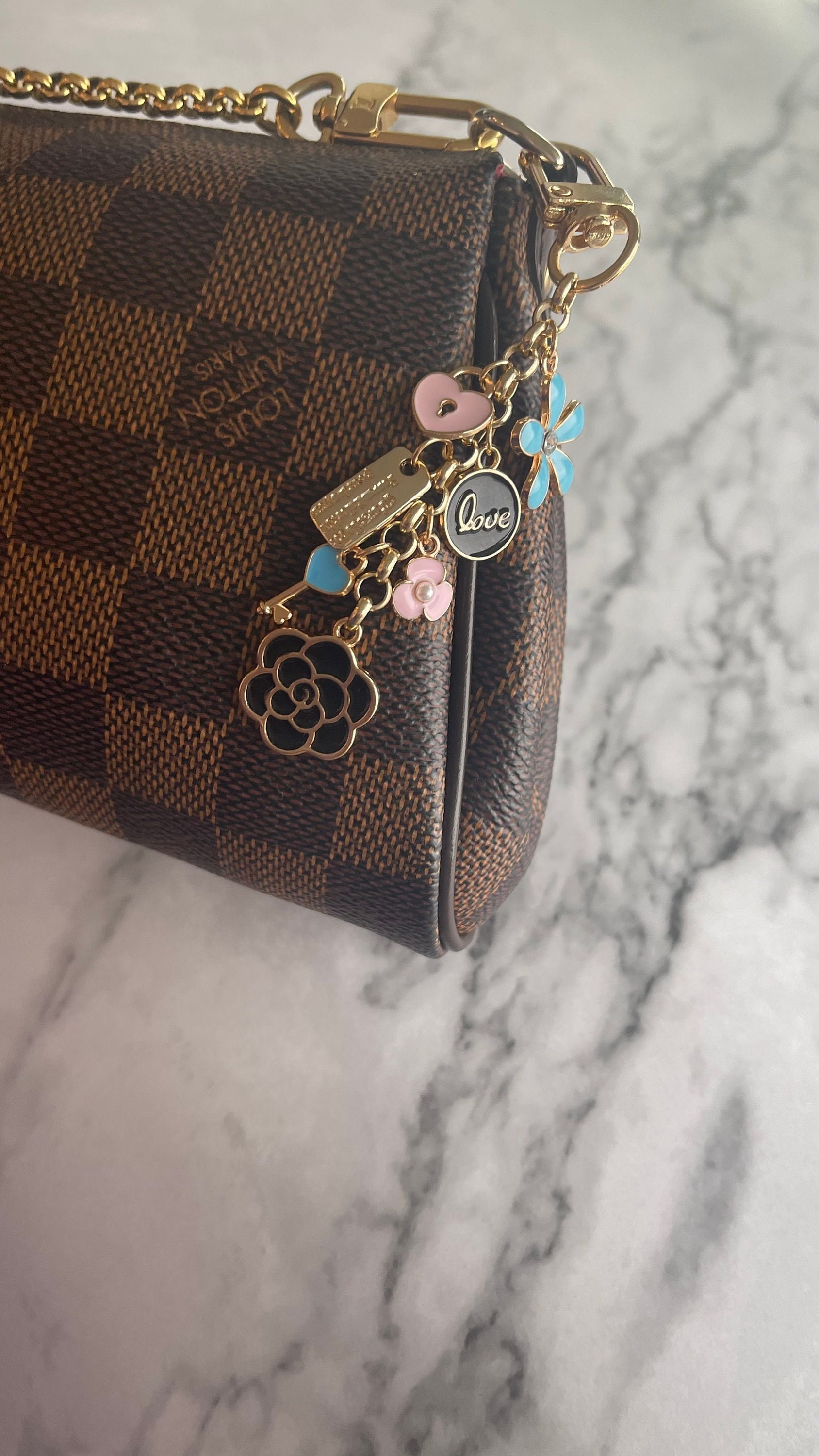 Gold & Beige Enamel Fleur De Monogram Bag Charm Chain