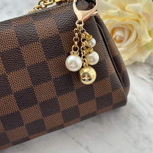 Pearls on Chains Handbag Charm .Price includes taxes,tariffs,shipping. Beautifully gift wrapped