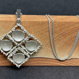 Silver pendant and chain