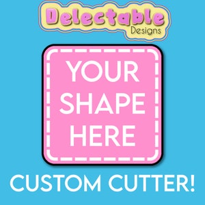Op de afbeelding: Een roze vierkant met een witte rand en een gestippeld lijnenpatroon. De tekst "YOUR SHAPE HERE" staat in wit binnen het vierkant. De tekst "CUSTOM CUTTER!" staat in wit onder het vierkant. De achtergrond is lichtblauw.  Delectable Designs staat in geel bovenaan de afbeelding.