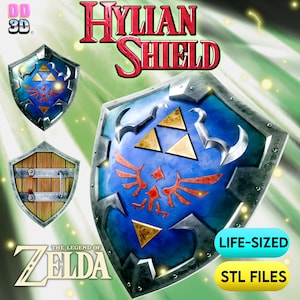 May include: A digital rendering of a Hylian Shield featuring a blue surface with a red bird emblem and gold triforce symbols. The shield has a metallic silver border. The image includes text reading HYLIAN SHIELD, THE LEGEND OF ZELDA, LIFE-SIZED, and STL FILES.