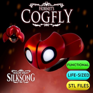 May include: A red and black Cogfly prop from the Hollow Knight: Silksong video game, with white eye details. The image includes the text "Hornet's Cogfly", "Functional", "Life-Sized", and "STL Files".