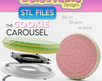 May include: A 3D printed cookie carousel with a pink and green base and a black and white rotating platform. The carousel is disassembled to show the different parts. The text "Delectable Designs" and "The Cookie Carousel" is visible on the image.