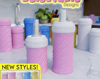 May include: A set of colorful plastic containers with a swirl design. The containers are labeled "Delectable Designs" and "New Styles!" The containers are perfect for storing and organizing small items.