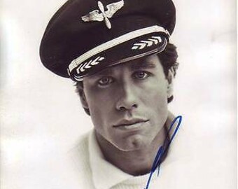 ジョン・トラボルタとレネ・ルッソのサイン入り8x10ゲットショーティ