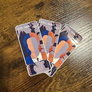May include: Three colorful ticket stubs for the SUGA | Agust D TOUR. The text on the ticket stub reads "SUGA | Agust D TOUR" and "The Final: LIVE DREAMING" with the date "August 04, 2023" and the time "8:00 PM (KST)".