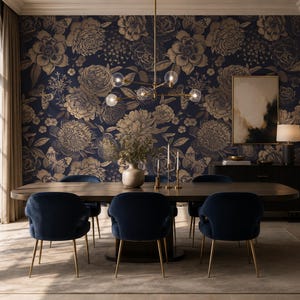 May include: A dining room featuring a dark blue wallpaper with a gold floral and butterfly pattern. The room includes a long wooden table, six navy blue velvet chairs with gold legs, a modern gold chandelier, and a black sideboard with a lamp.