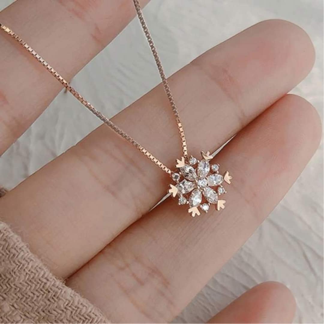 Snowflake on sale pendant meaning